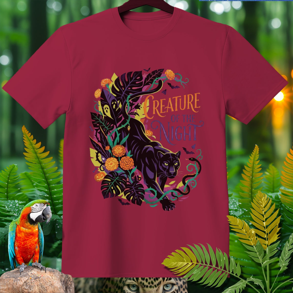 Maroon t-shirt with black panther and jungle foliage design, reading "Creature of the Night".