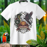 White t-shirt with dark gothic art featuring snake, raven, pumpkin, roses, and banner reading 