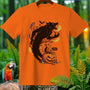 Orange t-shirt with a Halloween graphic featuring a werewolf, mouse, and pumpkin.