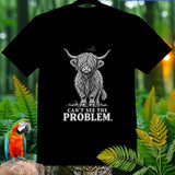 Black t-shirt with a shaggy highland cow graphic and text 