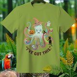 Green t-shirt with a Halloween octopus, pumpkin, ghost, cat, and text 