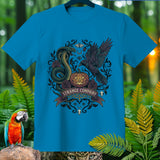 Blue t-shirt with Strange Company text, cobra, raven, pumpkin, and skulls design.