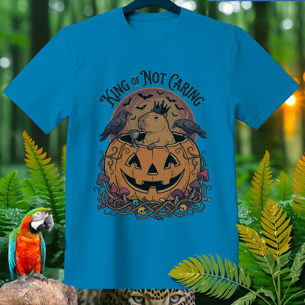 Capybara wearing crown in jack-o'-lantern with text "King of Not Caring".