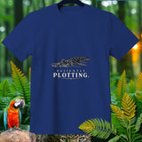 Blue t-shirt with an alligator graphic and the text 