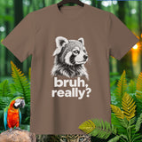 Brown t-shirt with a raccoon graphic and the text 