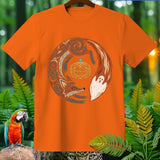 Orange t-shirt with a circular Halloween design featuring a fox, ghost, and pumpkin.
