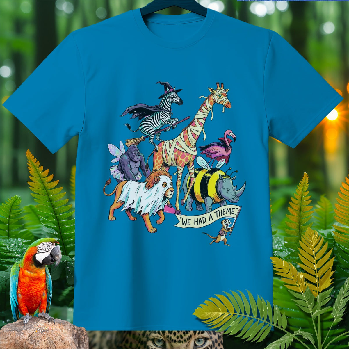 T-shirt design with costumed animals: zebra witch, mummy giraffe, bee rhino, ghost lion, fairy gorilla.
