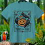 Teal t-shirt with Halloween graphic featuring crows, pumpkin, and text "Murder Has Plans".