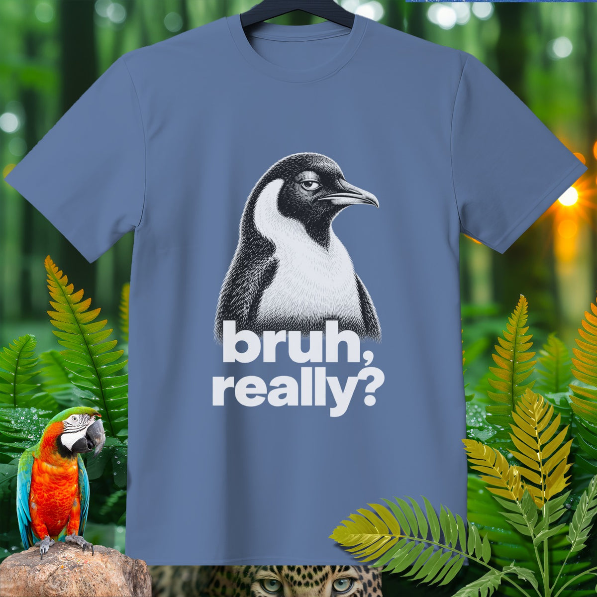 Blue t-shirt with a penguin graphic that says "bruh, really?"