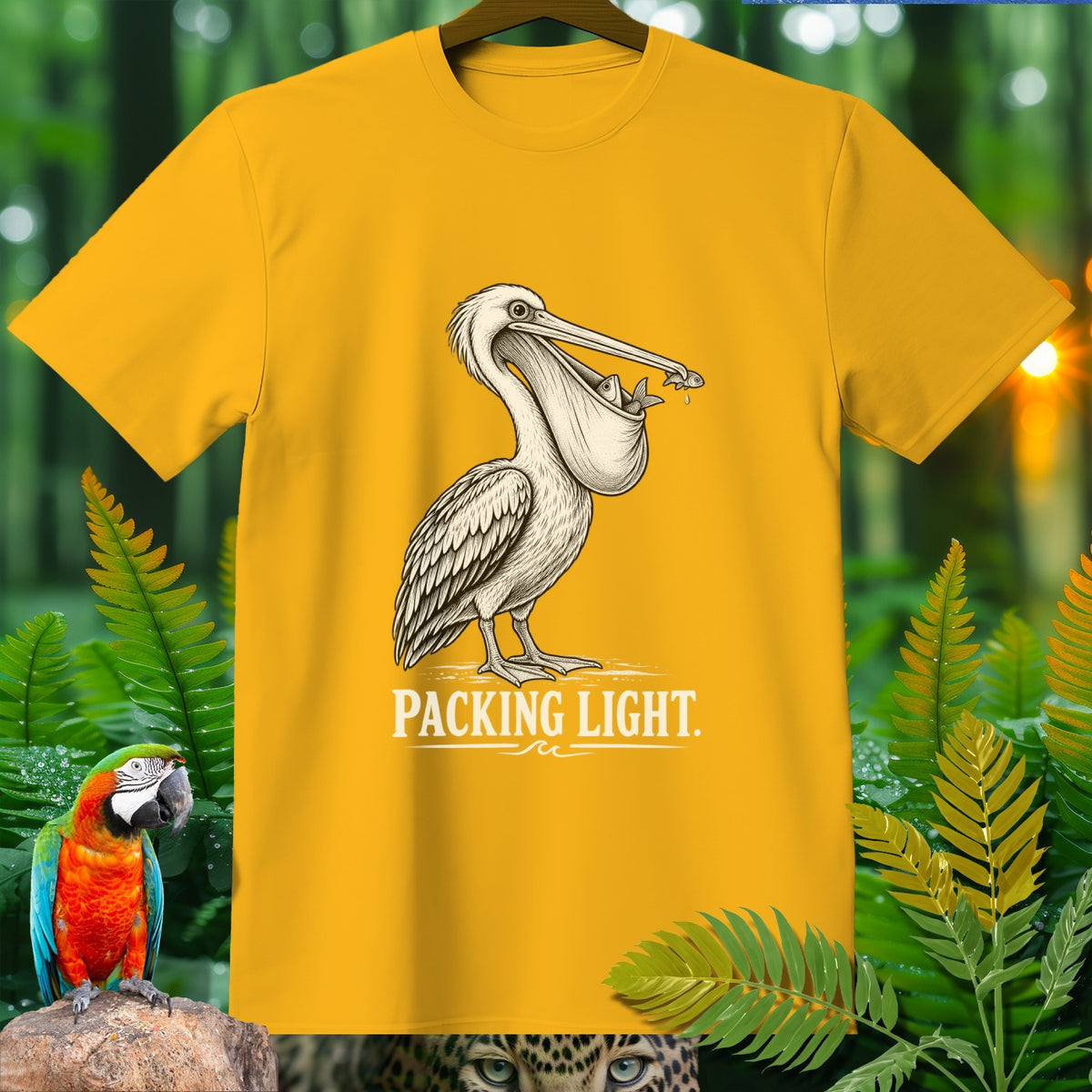 Yellow t-shirt with a pelican design and the text "PACKING LIGHT."