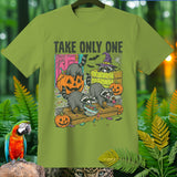 Raccoons reaching for candy in a Halloween scene with the text 