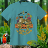 Teal t-shirt with leopard, pumpkins, bats, moon, and flowers. Text: 