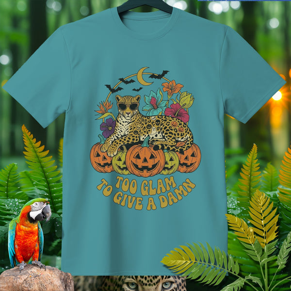 Teal t-shirt with leopard, pumpkins, bats, moon, and flowers. Text: "Too glam to give a damn".