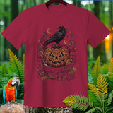 Maroon t-shirt with jack-o'-lantern, crow holding key, and 
