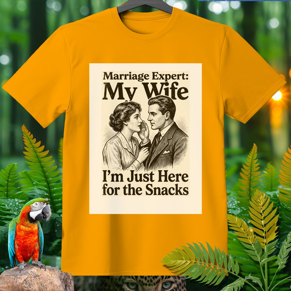Yellow t-shirt with a graphic that reads "Marriage Expert: My Wife, I'm Just Here for the Snacks."