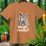 Orange t-shirt with a drawing of an owl and the text 