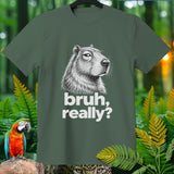 Green t-shirt with capybara illustration and text 