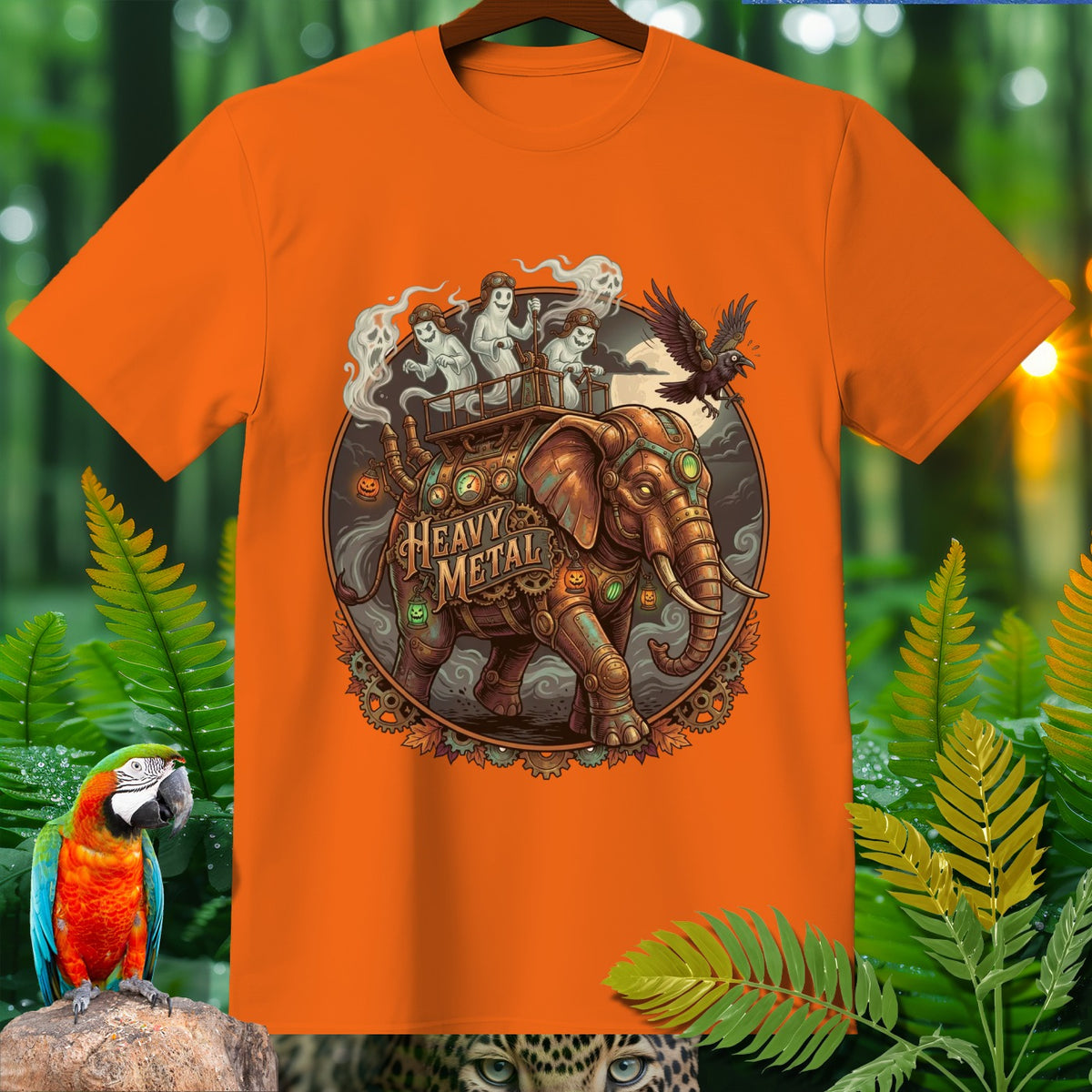 Orange t-shirt with a circular graphic of a steampunk elephant carrying ghosts and a crow.