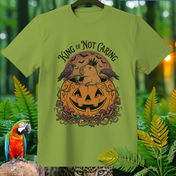 Capybara wearing crown inside a pumpkin with crows and text "KING OF NOT CARING".