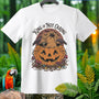 White t-shirt with "King of Not Caring" text and a capybara inside a pumpkin.