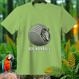 Light green t-shirt with an armadillo curled into a ball and the word BOUNDARIES.