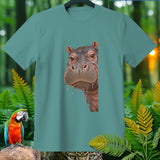 Teal t-shirt with a close-up realistic illustration of a hippo's face and jungle foliage.
