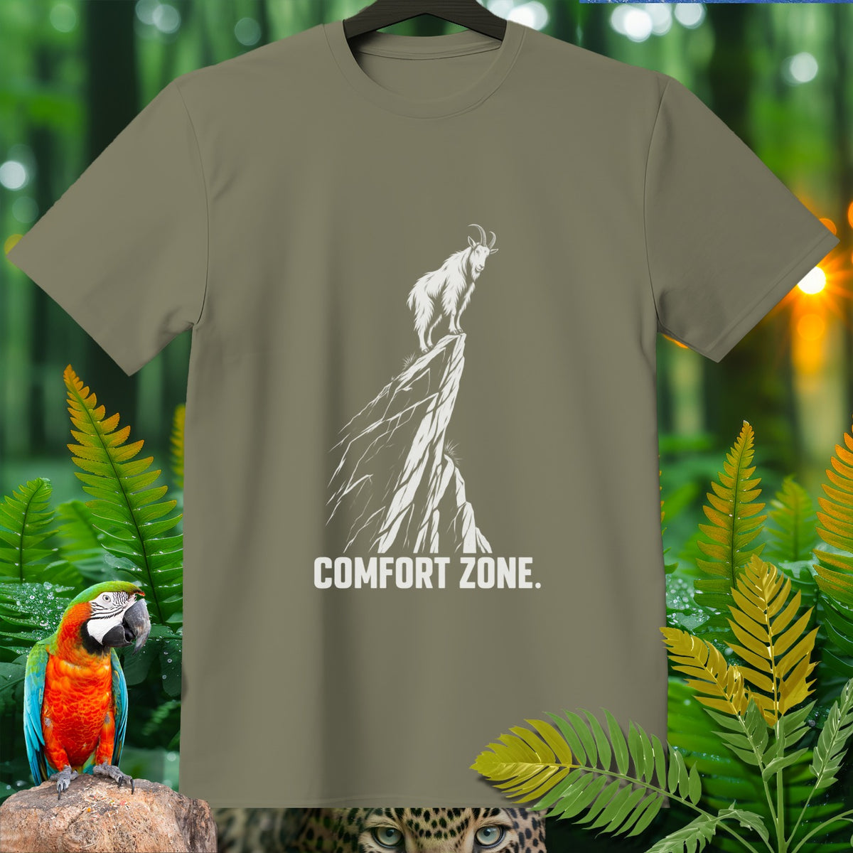 Olive green t-shirt with white graphic of mountain goat on a cliff and text "COMFORT ZONE."