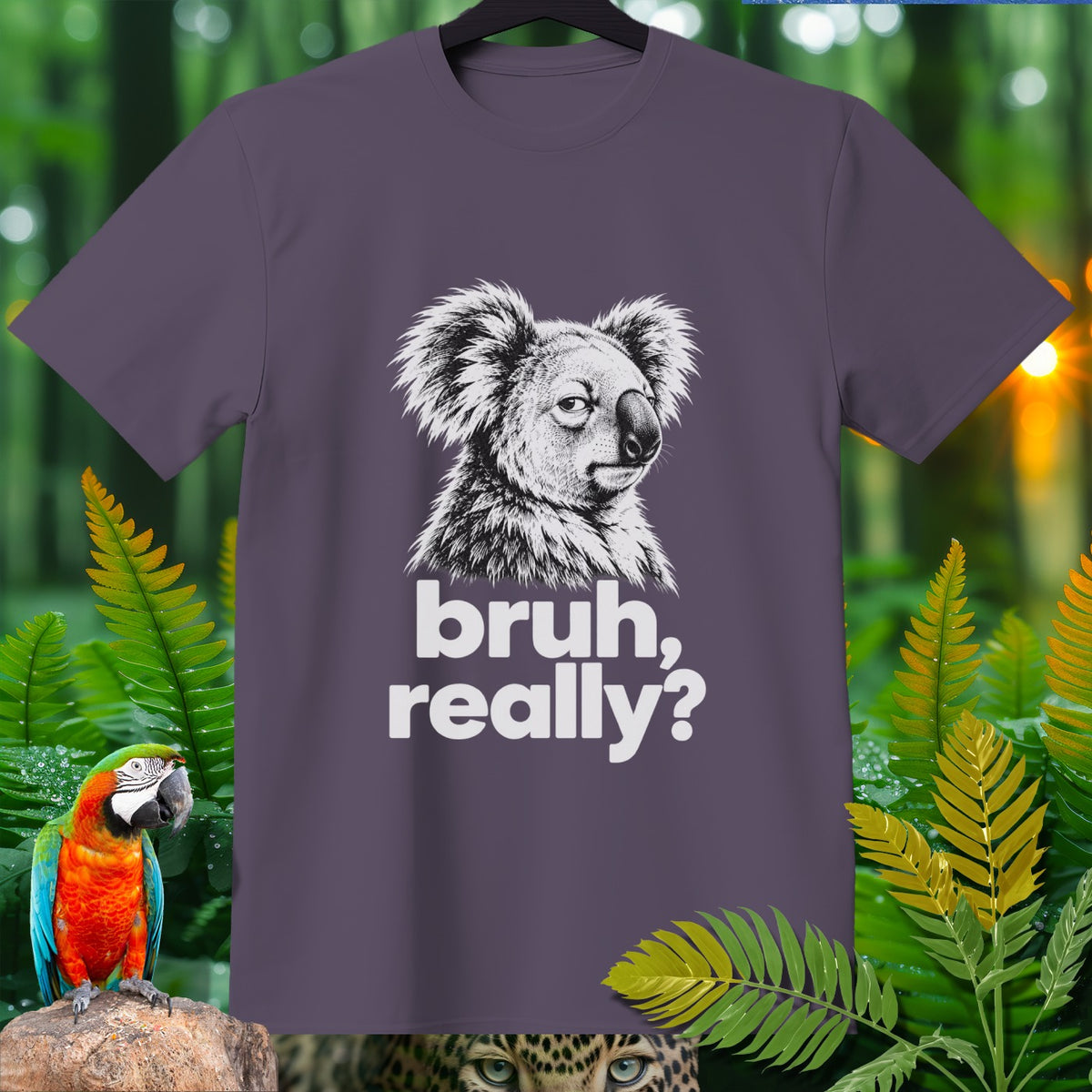 Purple t-shirt with black and white sketch of a koala saying "bruh, really?".