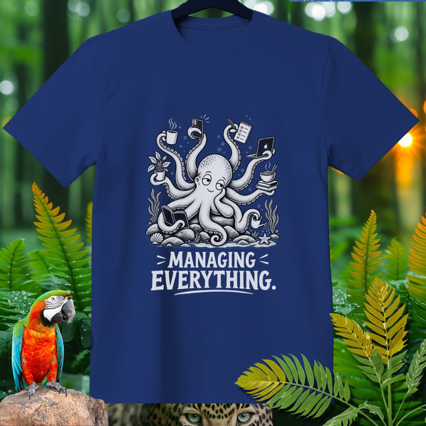 Blue t-shirt with cartoon octopus juggling coffee, laptop, phone, and plant, text reads "Managing Everything."
