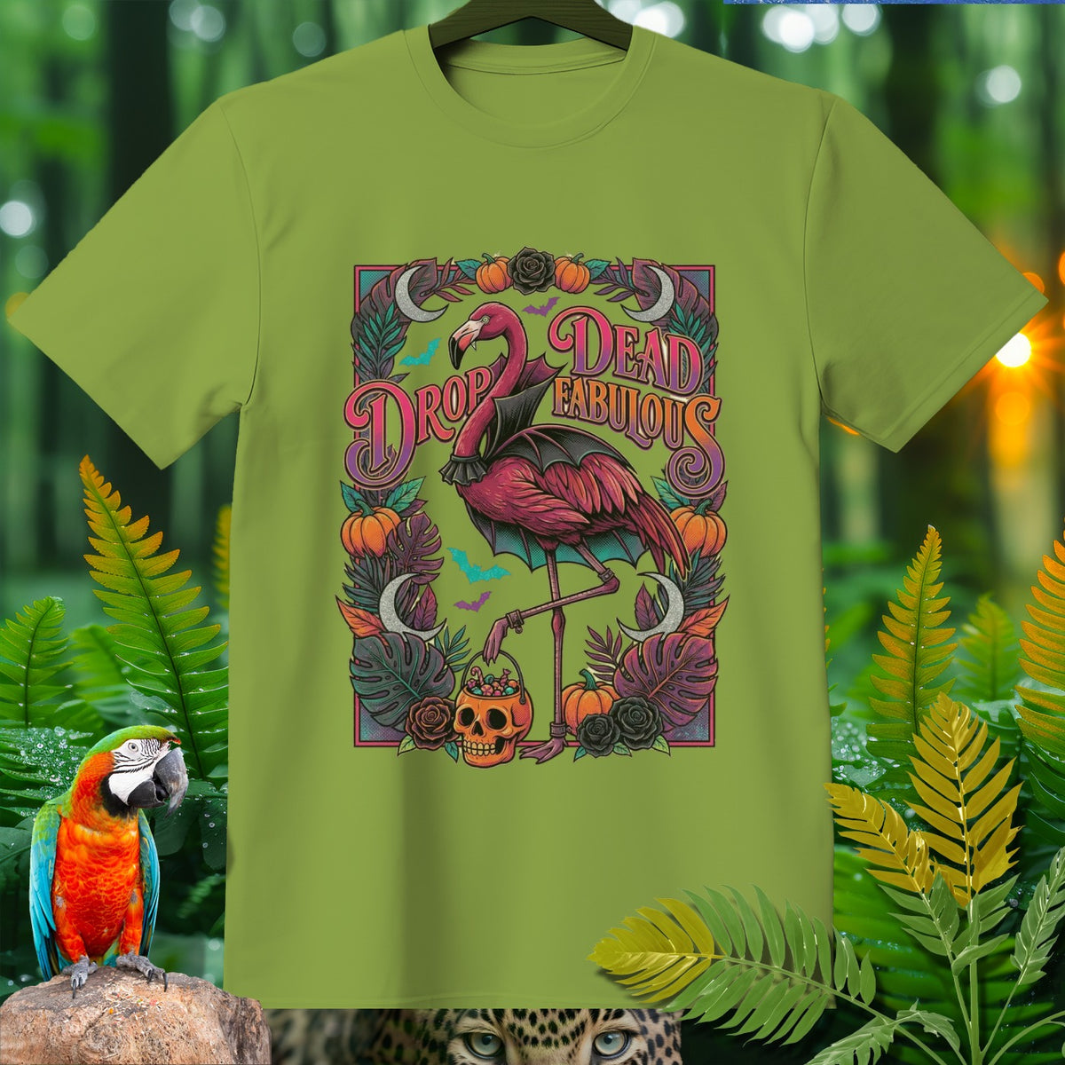Green t-shirt with a Halloween-themed graphic of a flamingo and text "Dead Fabulous".