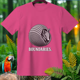 Pink t-shirt with a drawing of an armadillo and the text 