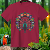 Maroon t-shirt with a peacock design featuring Halloween motifs like pumpkins and ghosts.