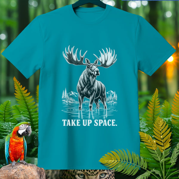 Moose in water with mountains and trees, "TAKE UP SPACE." text.