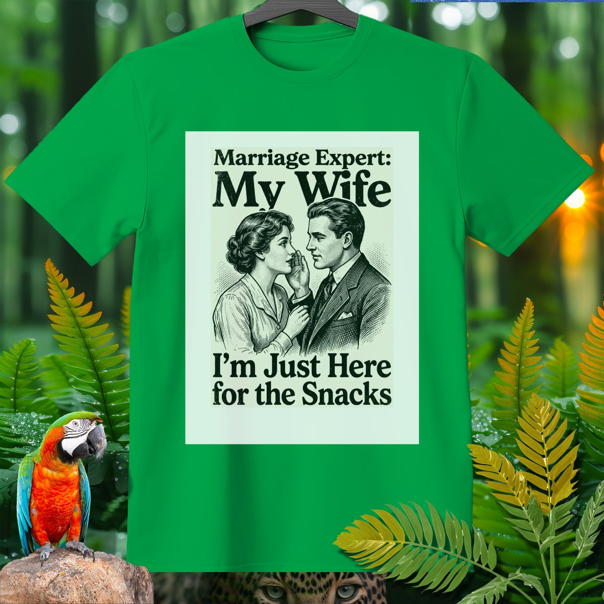 Green t-shirt with "Marriage Expert: My Wife I'm Just Here for the Snacks" text and illustration.