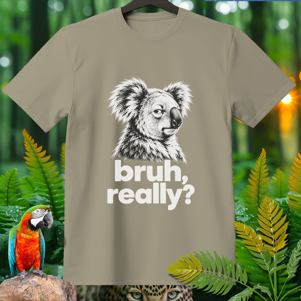 Tan t-shirt with black and white drawing of koala saying "bruh, really?"