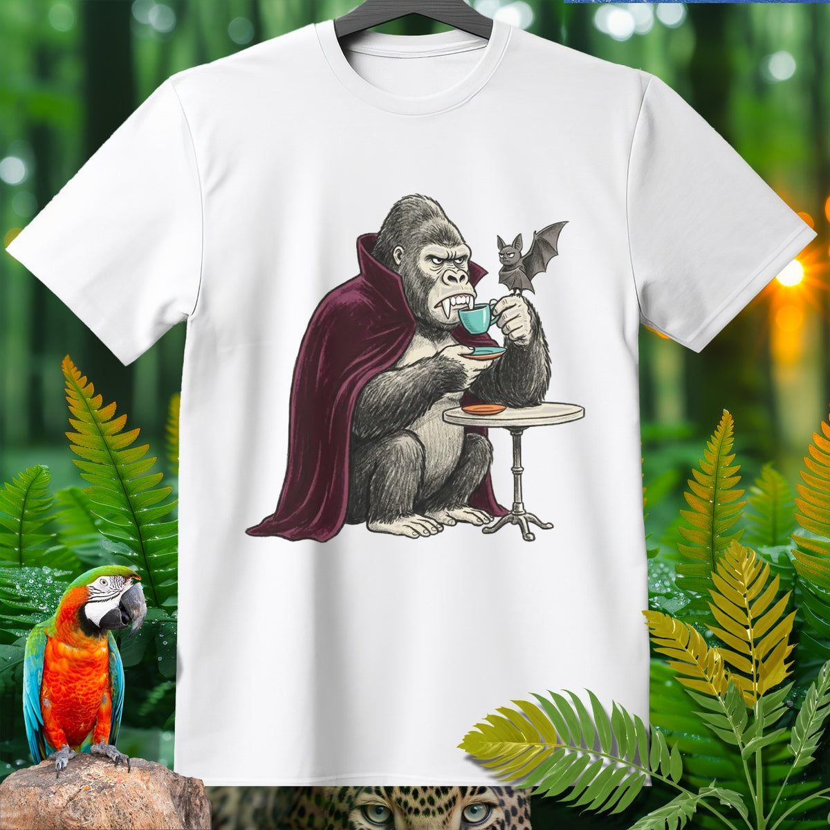 Gorilla in vampire cape drinks coffee with bat on a small table.