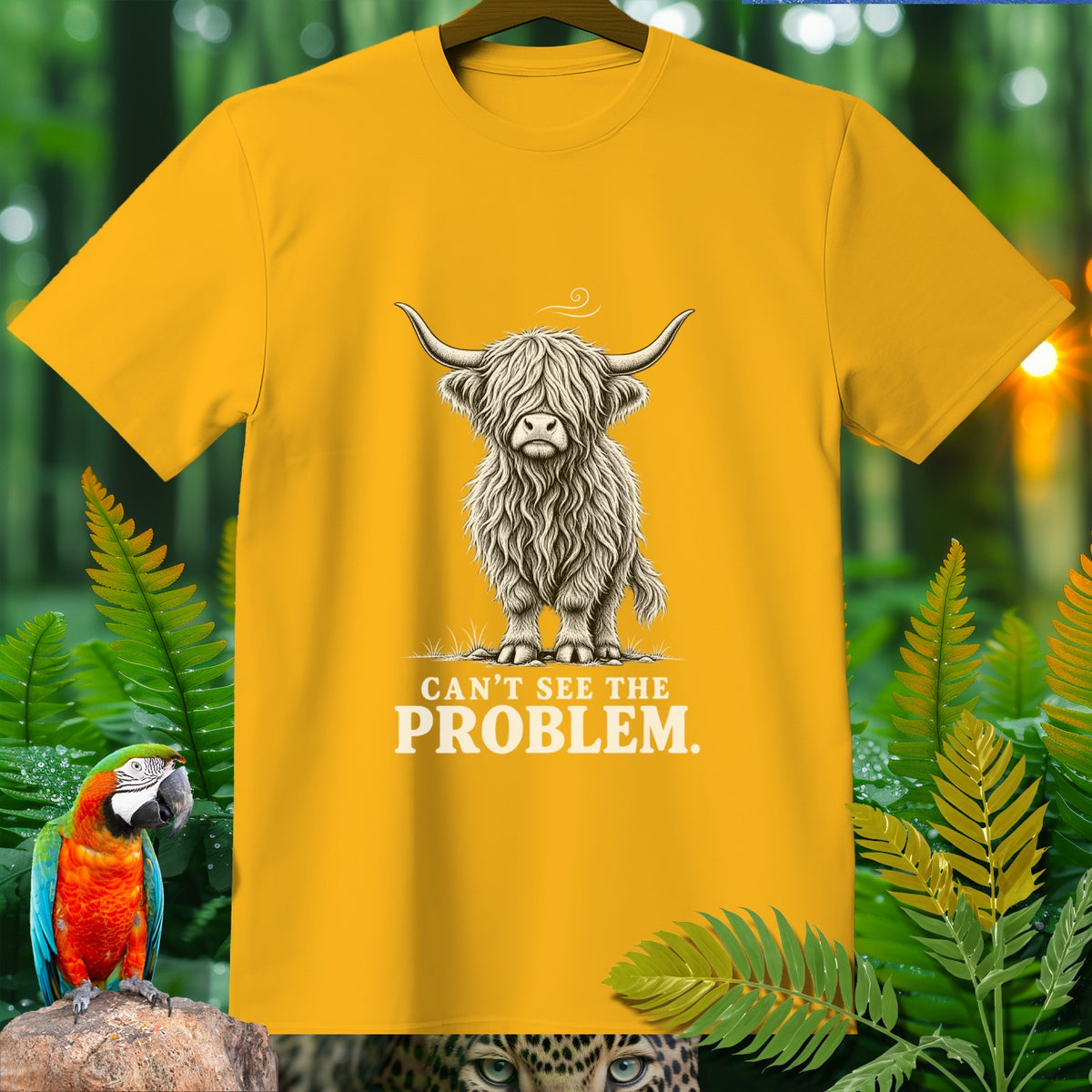 Yellow t-shirt with Highland cow graphic and text "CAN'T SEE THE PROBLEM."